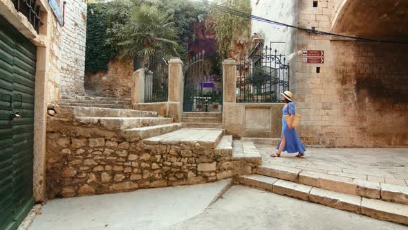 Young traveler walking in the old town. Croatia, Sibenik