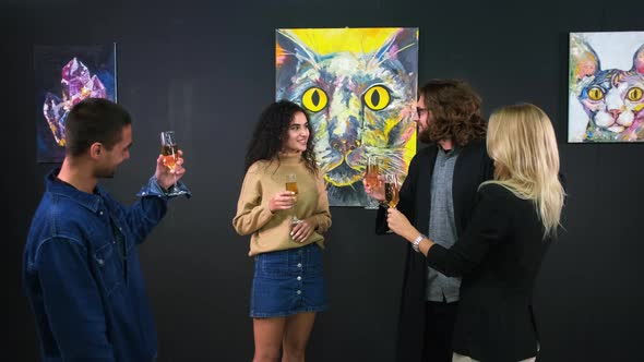Happy People are Celebrating Fine Art Exhibition Opening with Contemporary Style Pictures