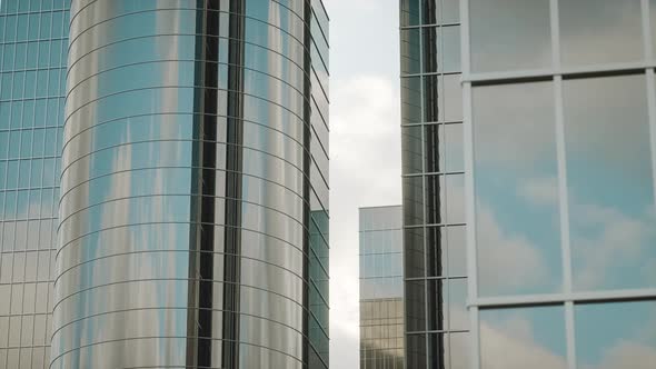 4K Video animation. Modern glass high-rise buildings. Industrial architecture concept.