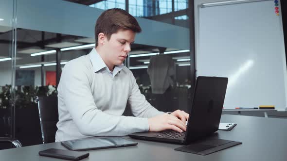 Financial Analyst Preparing Report Before Deadline