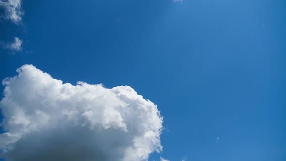 Clouds Move Smoothly in the Blue Sky. Timelapse