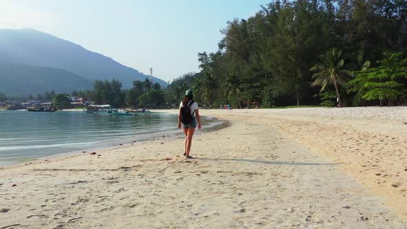 Tourists best friends on perfect bay beach voyage by transparent lagoon with bright sandy background