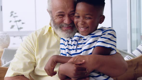 Mature man enjoying time with his grandson