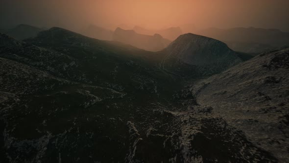 Dramatic Sky Over Rocky Mountains at Sunset