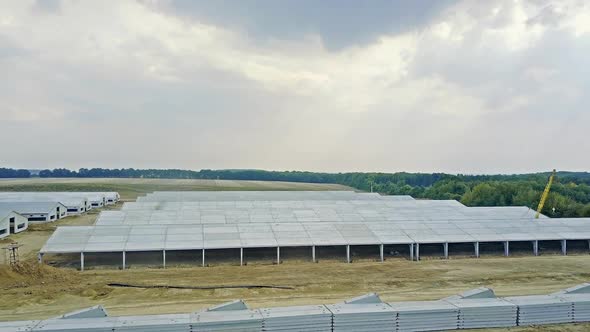 Constructing new farm. Aerial view of farm under construction for livestock