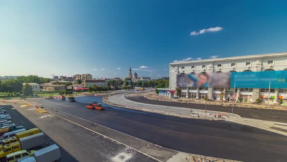 Workers Operating Asphalt Paver Machines During Road Construction and Repairing Works Timelapse