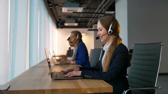 Pretty Confident Call-center Female Consultant Have Deal with Customers