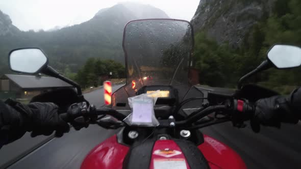 POV Biker Ride Motorcycle on Highway in Heavy Rain with Fog By Austria Mountains