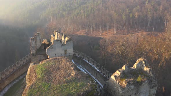 A Ruin of a Rock Castle on Top of a Hill, Set in Nature, View From Above