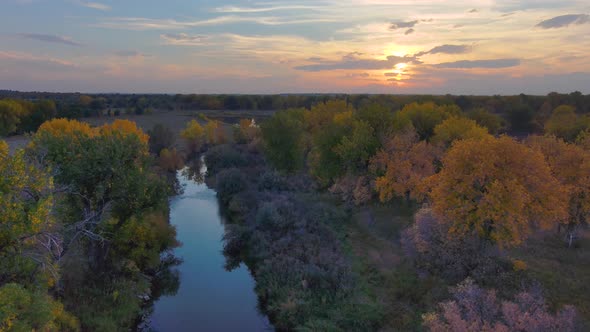 Platte river in Northern Colorado during the fall.  Colorful trees and a peaceful river during a spe