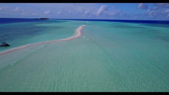 Aerial abstract of relaxing resort beach trip by shallow ocean with white sandy background of a dayo