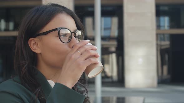 Elegant Businesswoman on Coffee Break