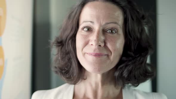 Closeup Portrait of Caucasian Beautiful Businesswoman in Office