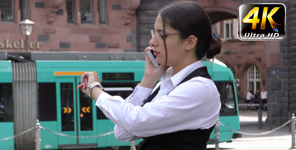 Business Woman Talking to Cellphone in City