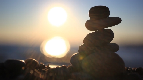 Stones Pyramid On Beach Symbolizing Zen, Harmony