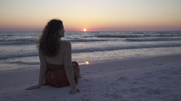Woman Relaxing On Beach At Sunset (1 Of 4)