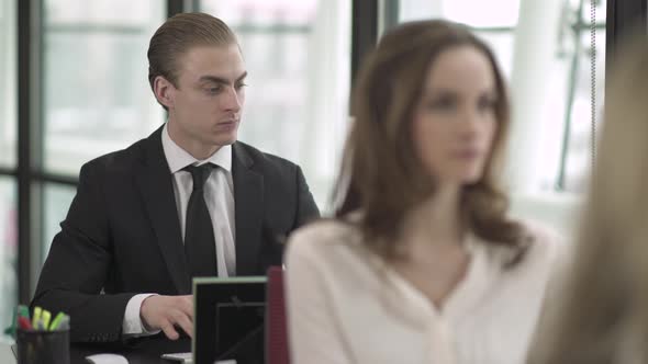 A Caucasian Man Works In A Attractive Modern Office (1 Of 5)