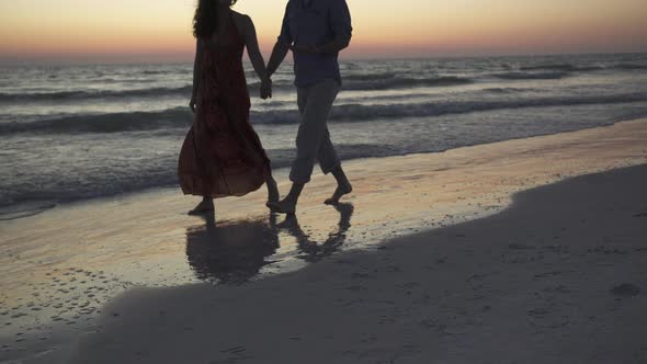 Couple Walking On Beach At Sunset (13 Of 23) alt