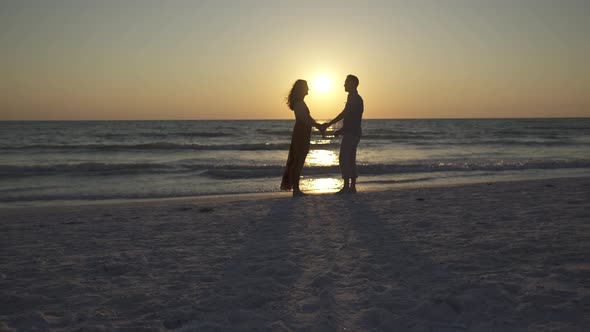 Couple Walking On Beach At Sunset (18 Of 23)
