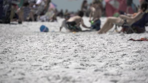 Depth Of Field Sand On A Busy Beach (6 Of 8)