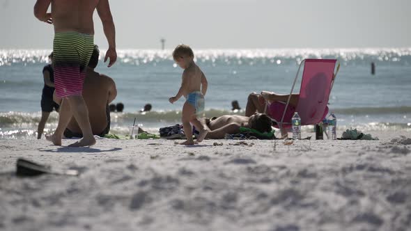 People Relaxing On A Busy Beach (4 Of 11)
