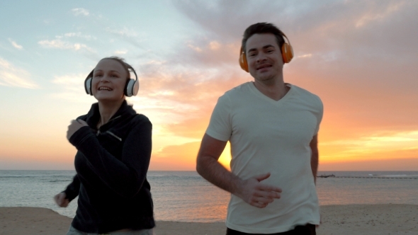 Two Friends Running In Lights Of The Rising Or alt