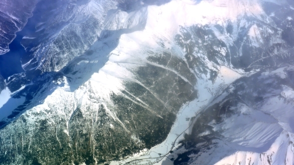 Picturesque View To The Mountains From Plane