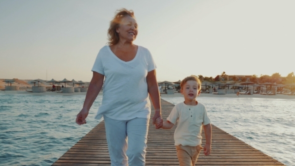 Grandmother And Grandson Having Outdoor Walk On