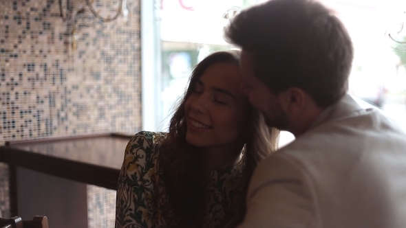 Happy Couple At The Coffee Shop