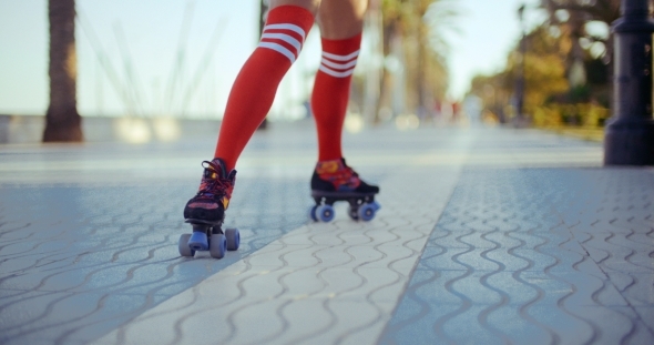 Sexy Roller Girl Skating On Exotic Promenade