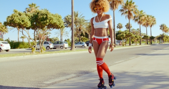Sexy Girl Standing On Her Roller Skates