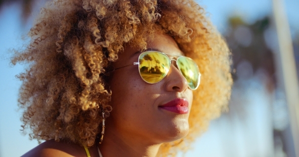 Close Up Portrait Of Exotic Girl With Afro Haircut