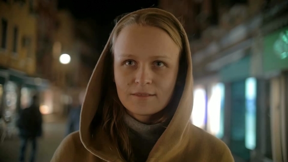 Woman In Coat And Cowl Walking Outdoor