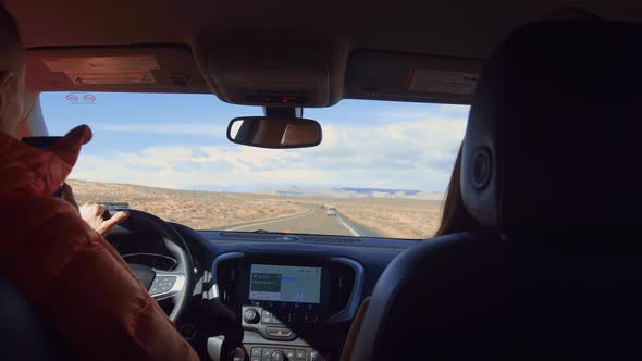 Young traveler riding in a car