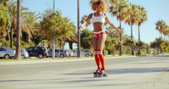 Sexy Girl Riding On Roller Skates