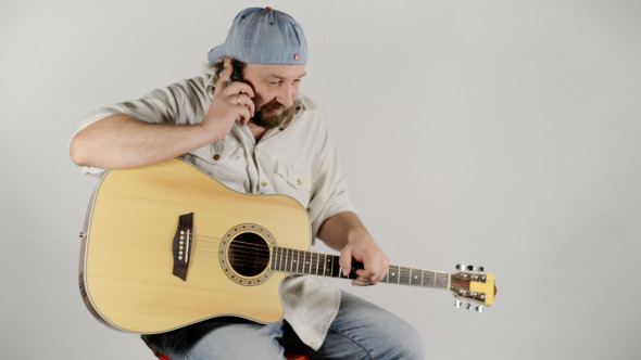 Musician Talking on Phone