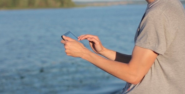 Man Typing On The Tablet  alt