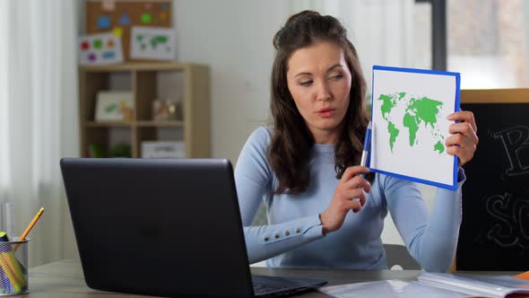 Teacher with World Map Having Online Class at Home