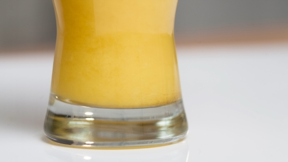 Glass Of Fresh Orange Juice At Juicers