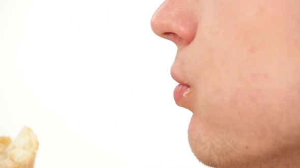 Man Eating a Big Hamburger - Fast Food. alt