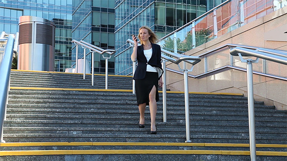 Business Woman Down the Stairs alt