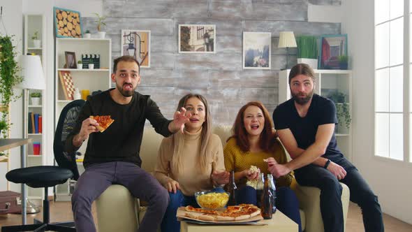 Crazy Group of Friends Celebrating Victory of Their Football Team