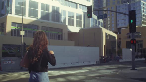 Smiling Girl Looking Around Crossing Road