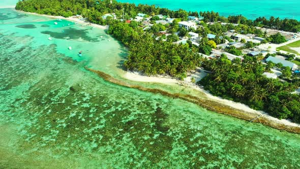 Aerial tourism of luxury seashore beach time by aqua blue lagoon with white sand background of journ