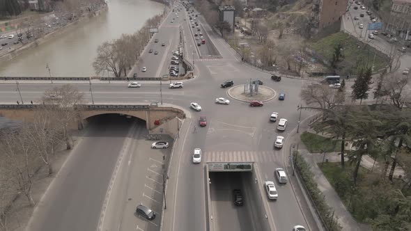 Aerial View of Galaktion Tabidze Bridge over Kura river in the centre of Tbilisi. Georgia 2021 April