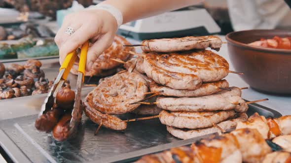 Ready-to-Eat Grilled Meat in a Street Food Shop Window. Ready-made Food on Party