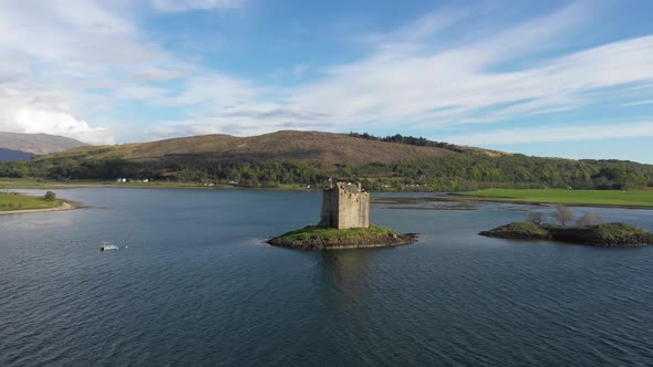 Aerial view of Castle Stalker and lake Loch Linnhe in Scotland