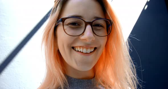 Woman with spectacles smiling 4k