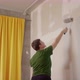 Woman Paint Wall in Her Room in Grey DIY Home Repair - VideoHive Item for Sale