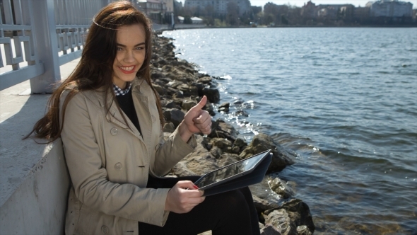 Woman On The Beach, Reading Tablet Computer alt